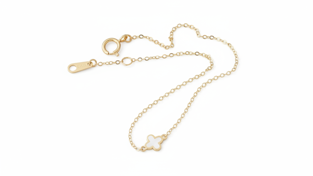 14k yellow gold bracelet featuring a clover design