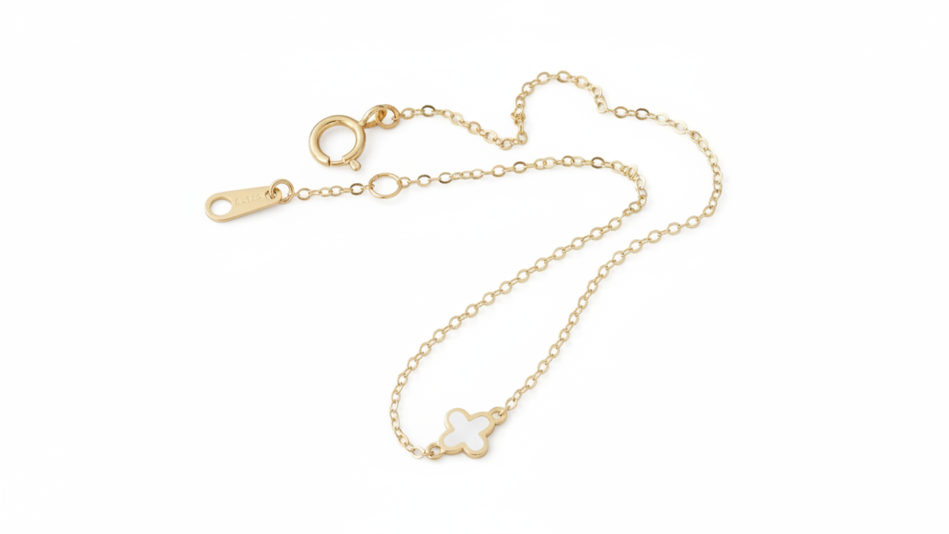 14k yellow gold bracelet featuring a clover design