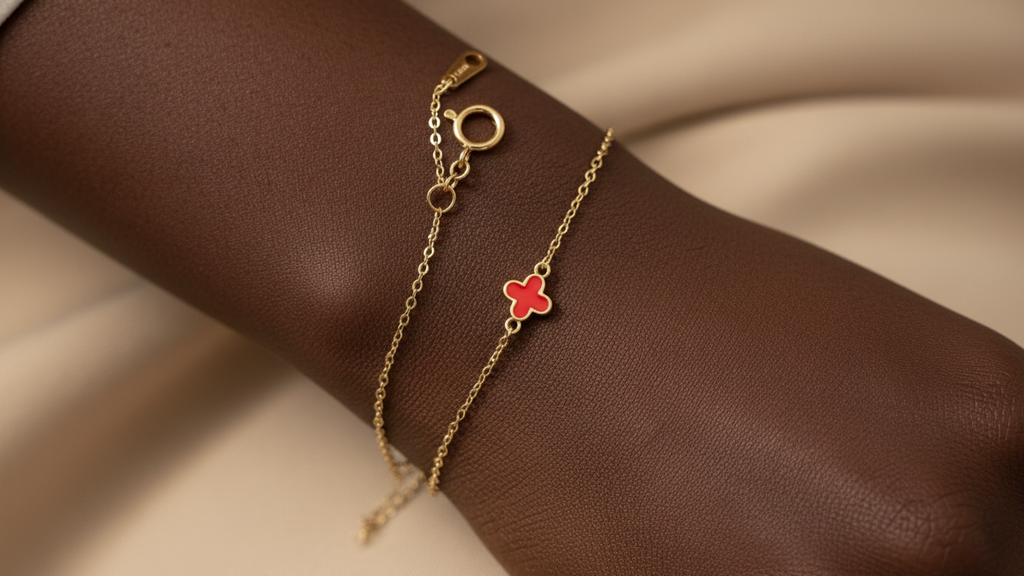 14k yellow gold bracelet featuring a clover design