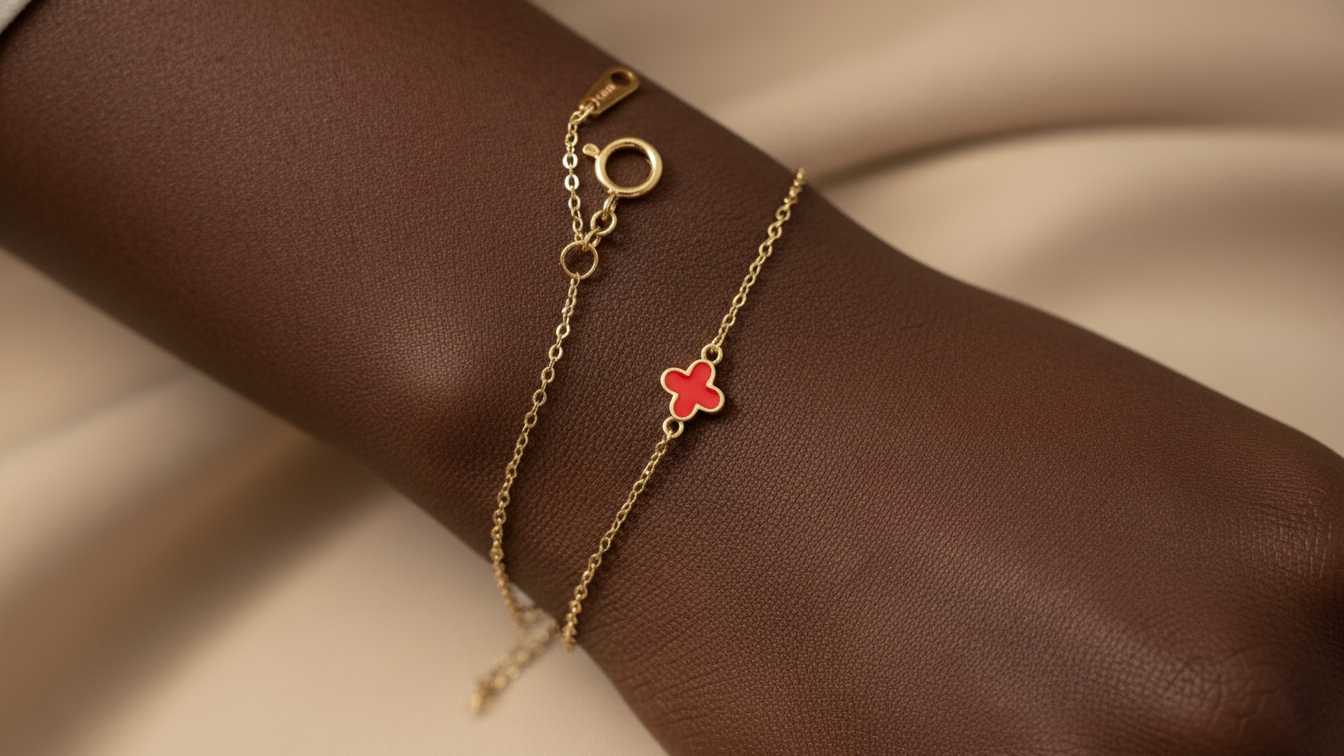 14k yellow gold bracelet featuring a clover design